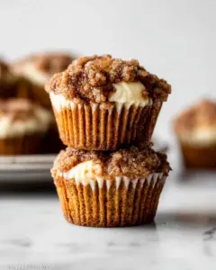 A delicious plate of Pumpkin Cream Cheese Muffins