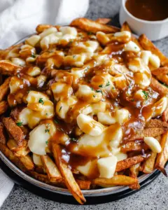 A delicious plate of Authentic Canadian Poutine Recipe