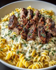 A delicious plate of Creamy Steak Pasta Garlic