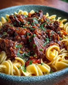 A delicious plate of Cozy Slow Cooker Beef and Noodles Recipe Easy Creamy Gravy Dinner